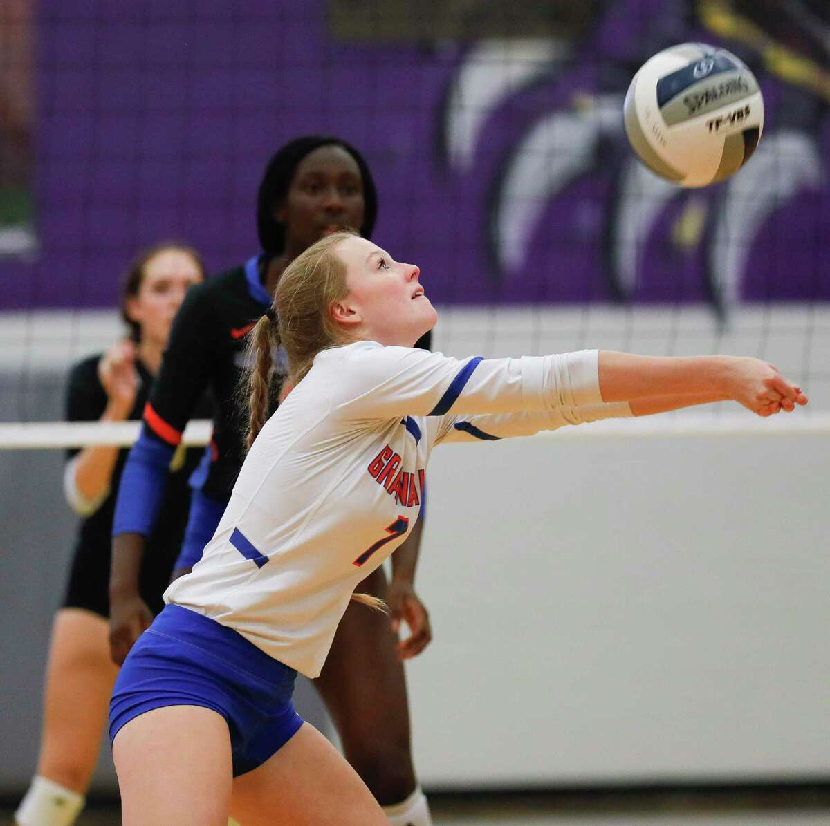 Grand Oaks libero Ava Terry (7) makes a pass in the first set of a high school volleyball match at Montgomery High School, Tuesday, Aug. 31, 2021, in Montgomery.