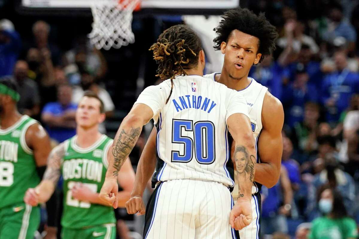 Last week, Jeff Dowtin Jr., right, assumed he was headed to Florida to again play for the Magic’s G-League affiliate.