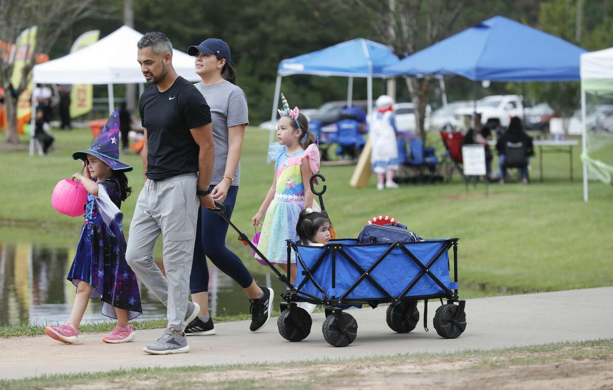 Families take part in Conroeâs annual Halloween in the Park at Carl Barton, Jr. Park, Saturday, Oct. 23, 2021, in Conroe.