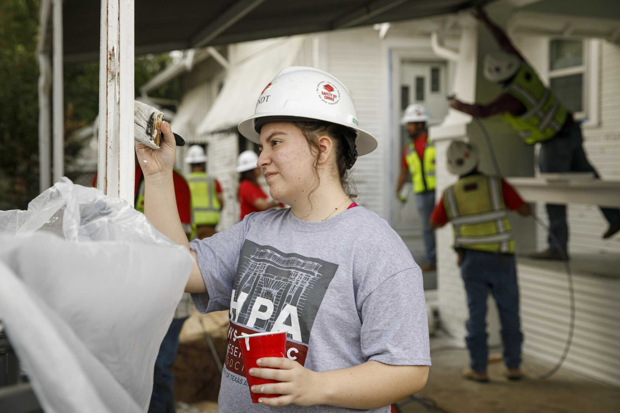 Polishing West Side 'gems': Volunteers fix up 100-year-old homes at annual Rehabarama - Vimarsana News