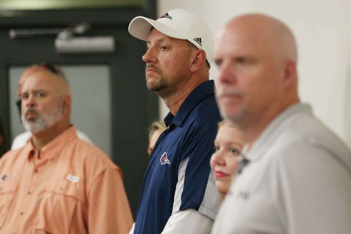 UTSA Head Football Coach Jeff Traylor, center, stand with Men?•s Golf Head Coach John Knauer, left, and Men?•s Basketball Head Coach Steve Henson, right, during a conference on the university joining the American Athletic Conference, Thursday, Oct. 21, 2021.