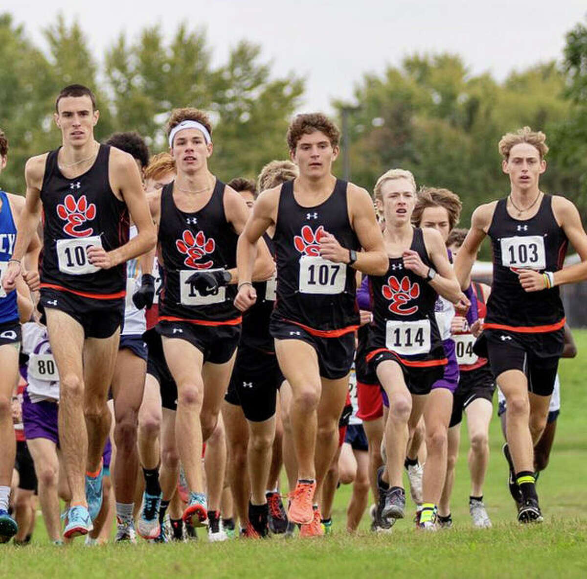 Edwardsville’s runners lead the pack near the start of the Class 3A Normal Community Regional inside Maxwell Park.