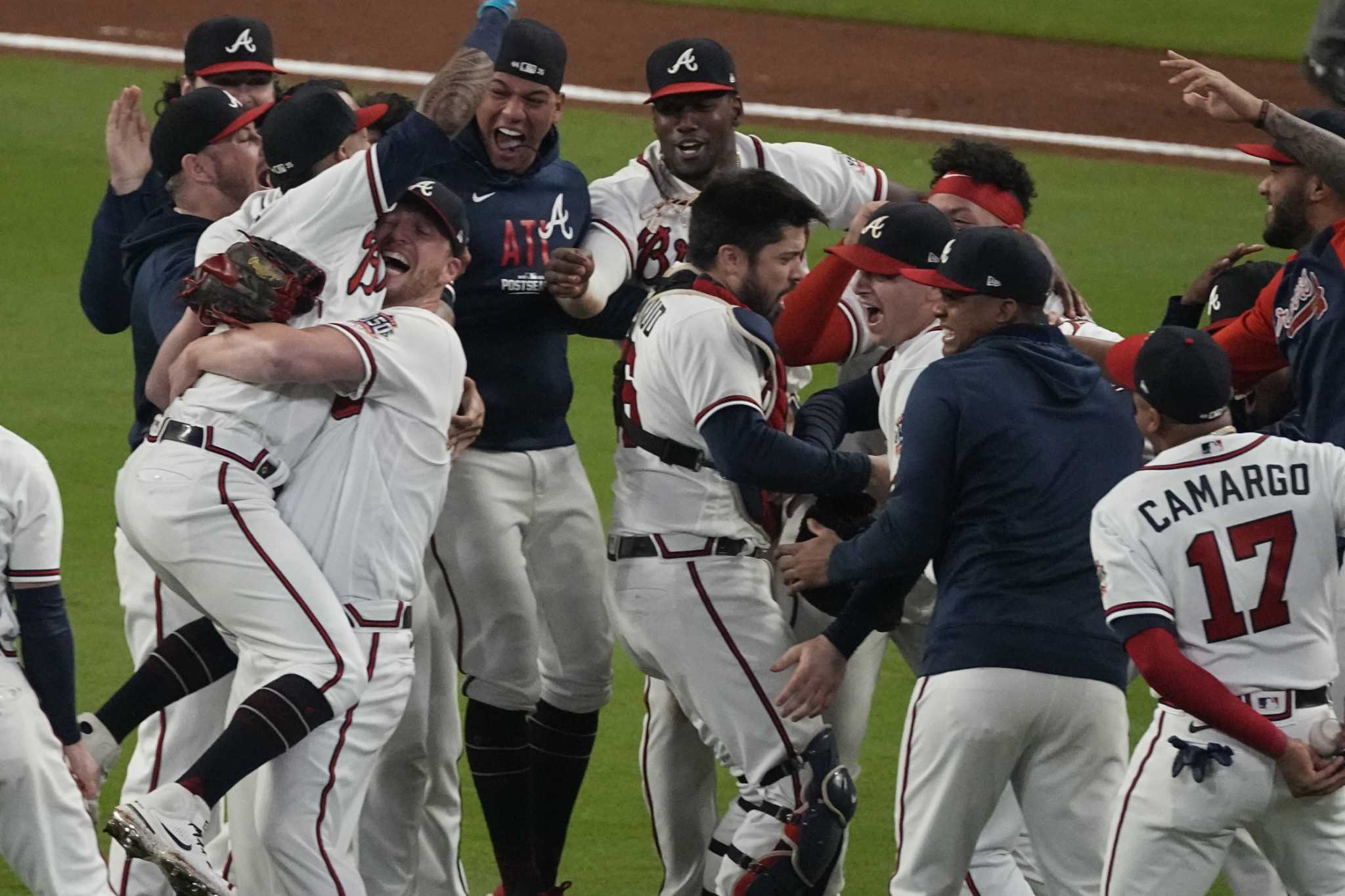 Braves beat Dodgers 4-2, head to first World Series since '99