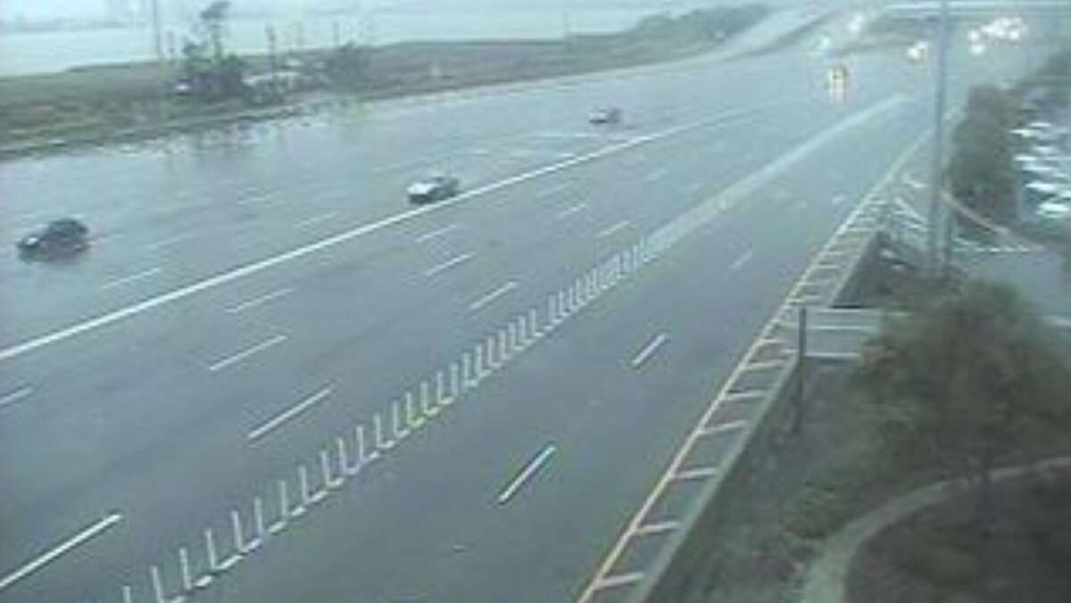 Heavy rain at the Bay Bridge toll plaza on Oct. 24, 2021. The image was taken from a Caltrans traffic camera.