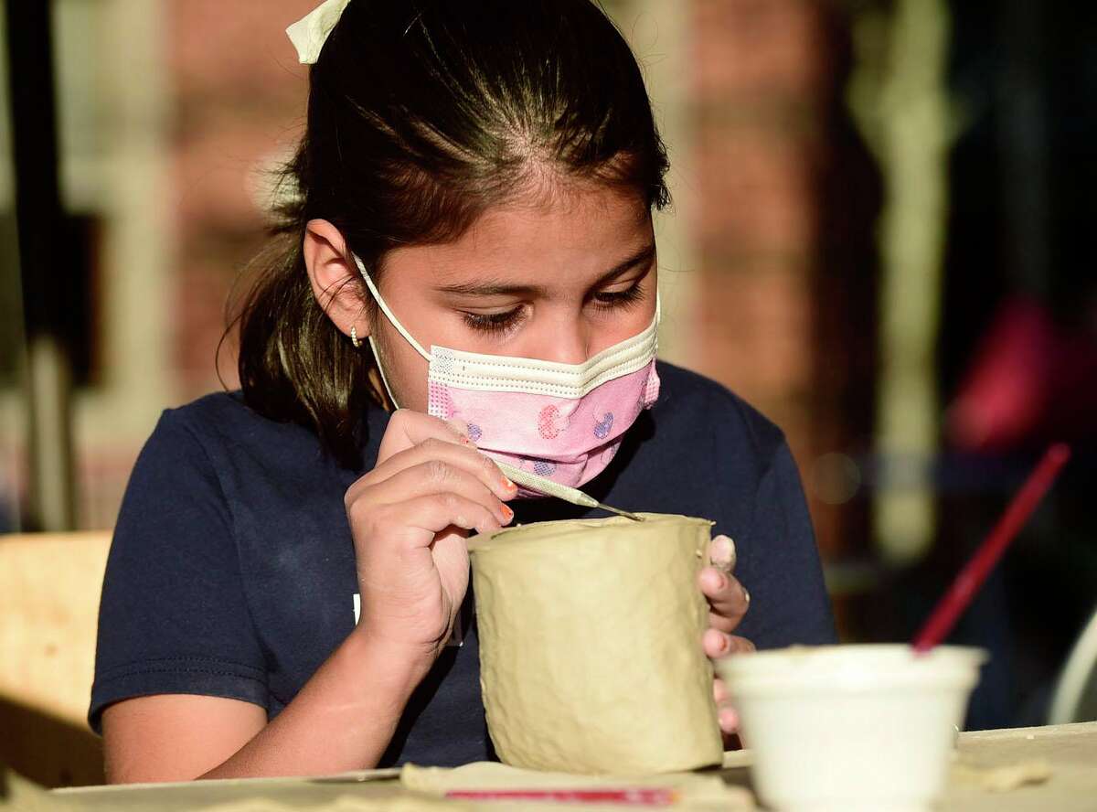 In Photos Kids Learn How To Mold Clay At The Darien Library