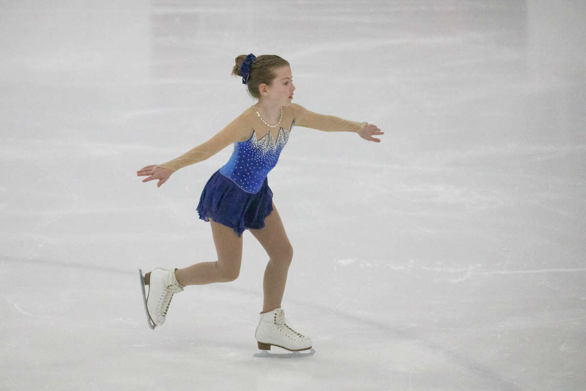 Kylee Shields of Hiawatha Skating Club performs at Skate Midland, Saturday, Oct. 23, 2021 at the Midland Civic Arena. (Drew Travis/for the Daily News)