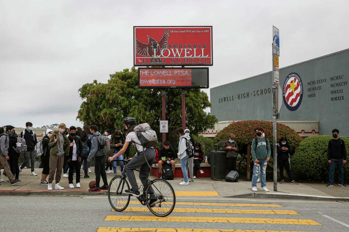 Students gather in front of Lowell High School as classes let out for the day in San Francisco, Calif. on Tuesday, Aug. 24, 2021.