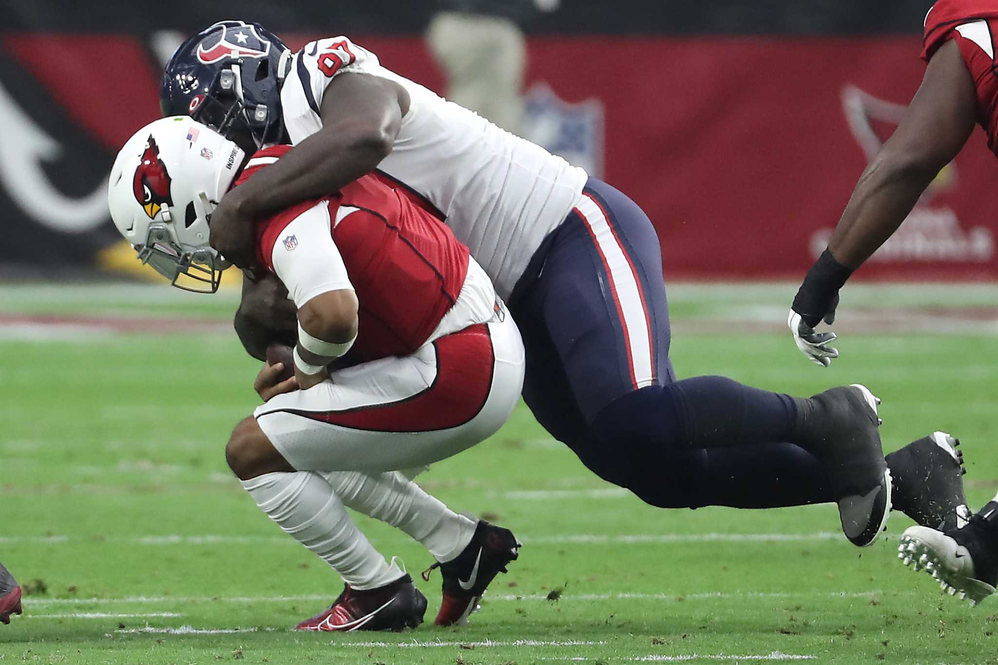 Houston Texans defensive tackle Maliek Collins (97) lines up against the  Tennessee Titans during the first half of an NFL football game Sunday, Jan.  9, 2022, in Houston. (AP Photo/Justin Rex Stock