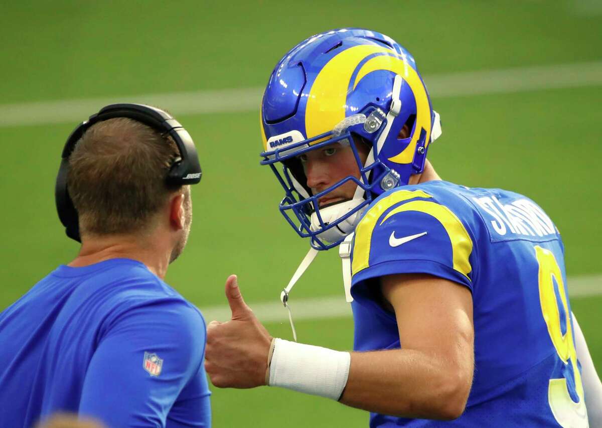 INGLEWOOD, CALIFORNIA - OCTOBER 24: Matthew Stafford #9 of the Los Angeles Rams gives a thumbs up to head coach Sean McVay during the second half in the game against the Detroit Lions at SoFi Stadium on October 24, 2021 in Inglewood, California.