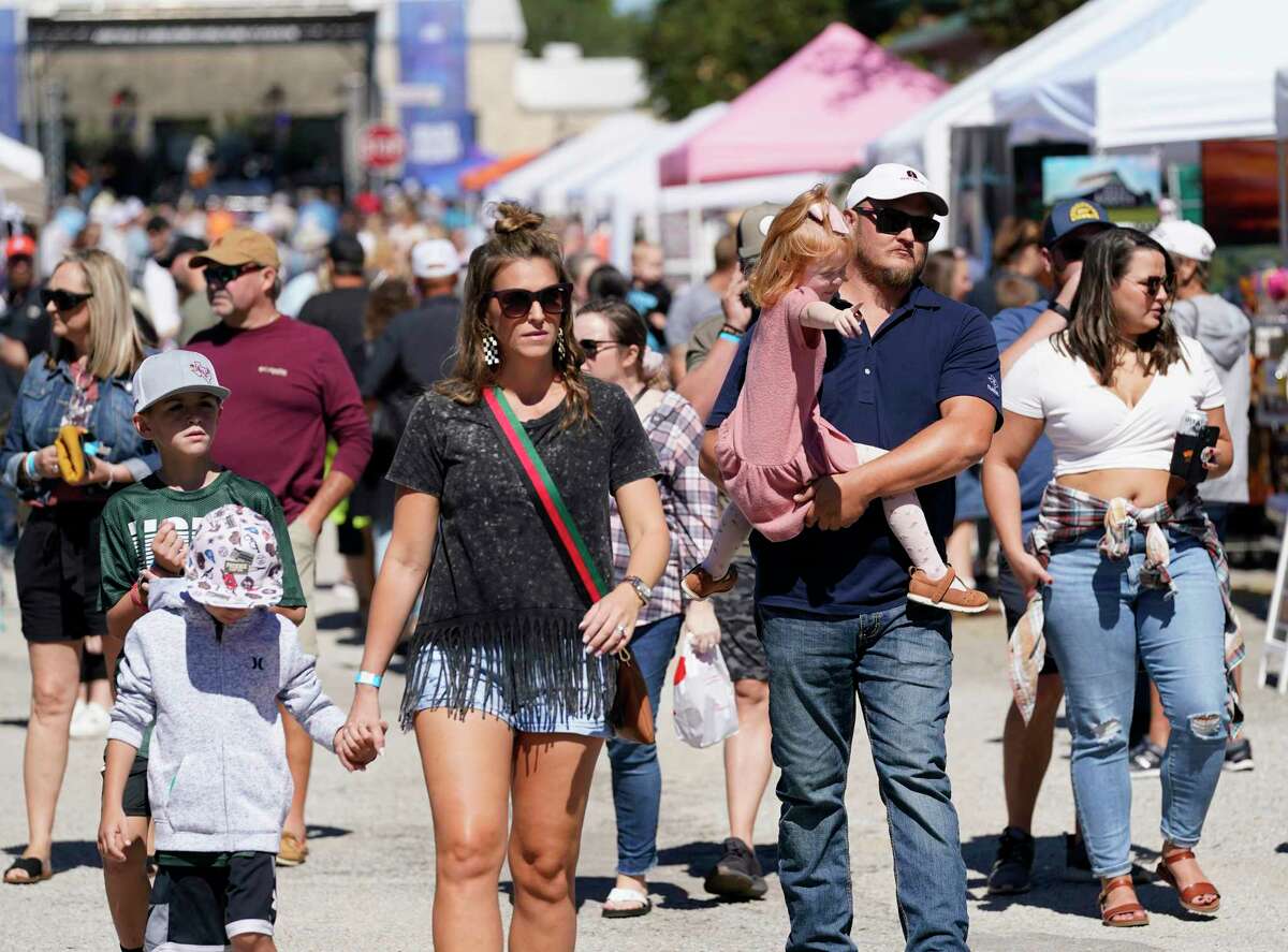 People attend the Montgomery Fall Festival in historic downtown Saturday, Oct. 16, 2021 in Montgomery.