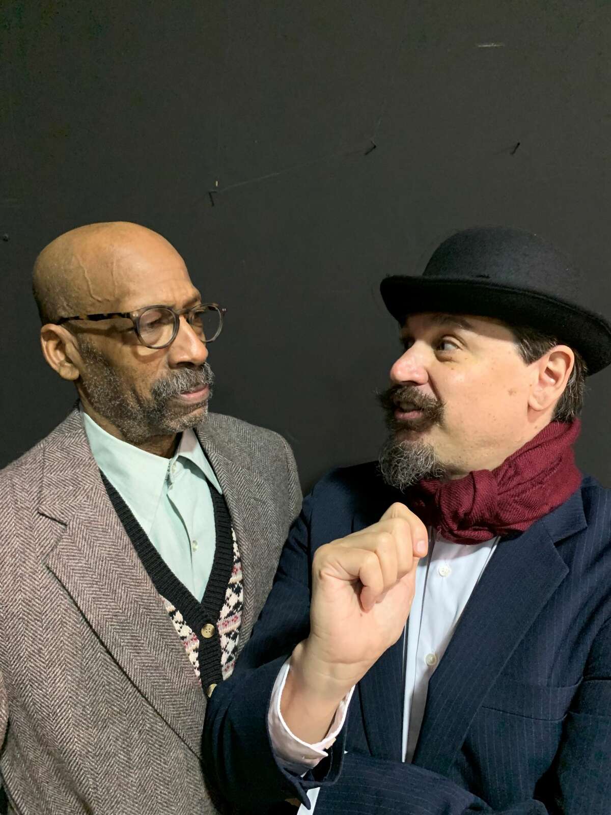 Dr. Bernard (Emmett Ferris) shows some skepticism at the theories posed by Hercule Poirot (John Michael Decker) in iTheatre Saratoga’s Poirots Investigate. Credits: iTheatre Saratoga
