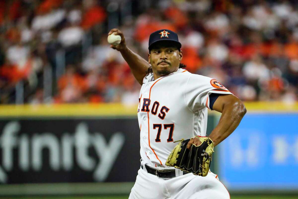 Houston Astros starting pitcher Luis Garcia (77) pitches during
