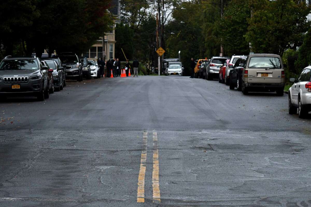 A portion of Barclay Street where a new road micro-surfacing technique was applied, upper, in contrast to the original surface, lower, on Monday, Oct. 25, 2021, in Albany, N.Y. Albany Mayor Kathy Sheehan announced a new street pavement preservation program for the city that includes the use of brine in place of salt crystals, undertaking a 3D assessment of every street and implementing a new road micro-surfacing technique.