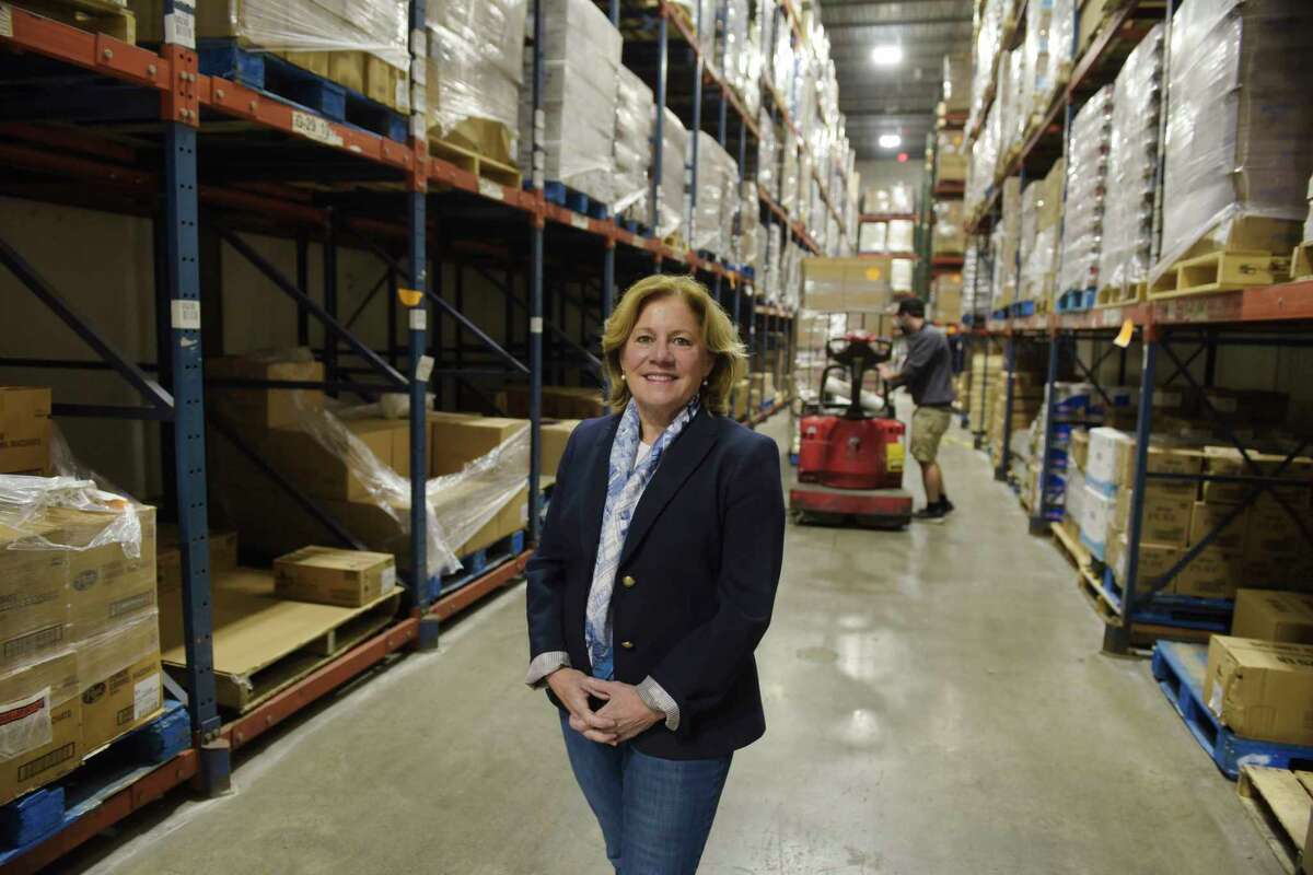 Molly Nicol, CEO of the Regional Food Bank of Northeastern New York, inside the main warehouse at the food bank on Tuesday, Oct. 12, 2021, in Latham, N.Y.