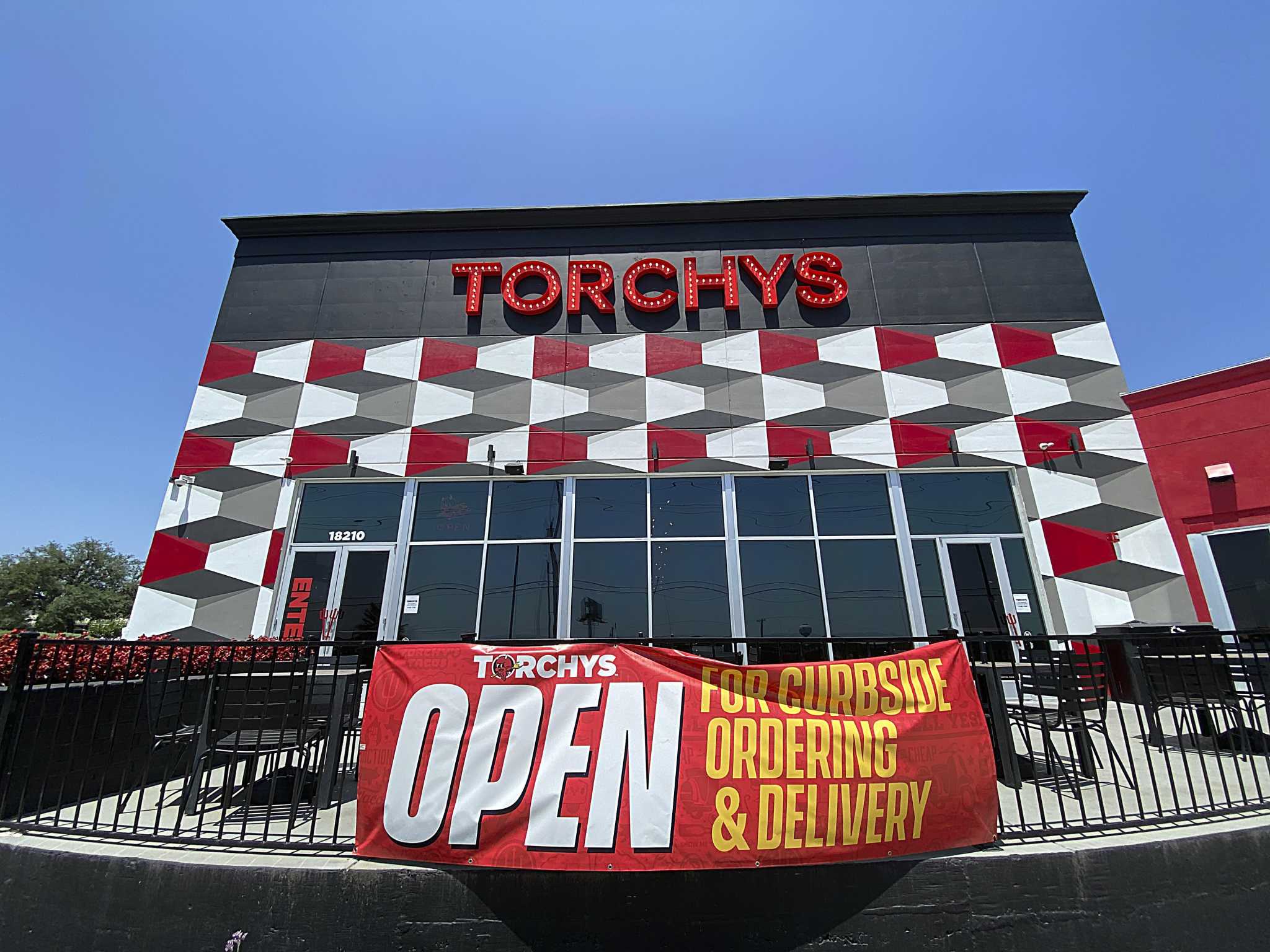 Texas woman sues Torchy's Tacos after finding cow tooth in her food