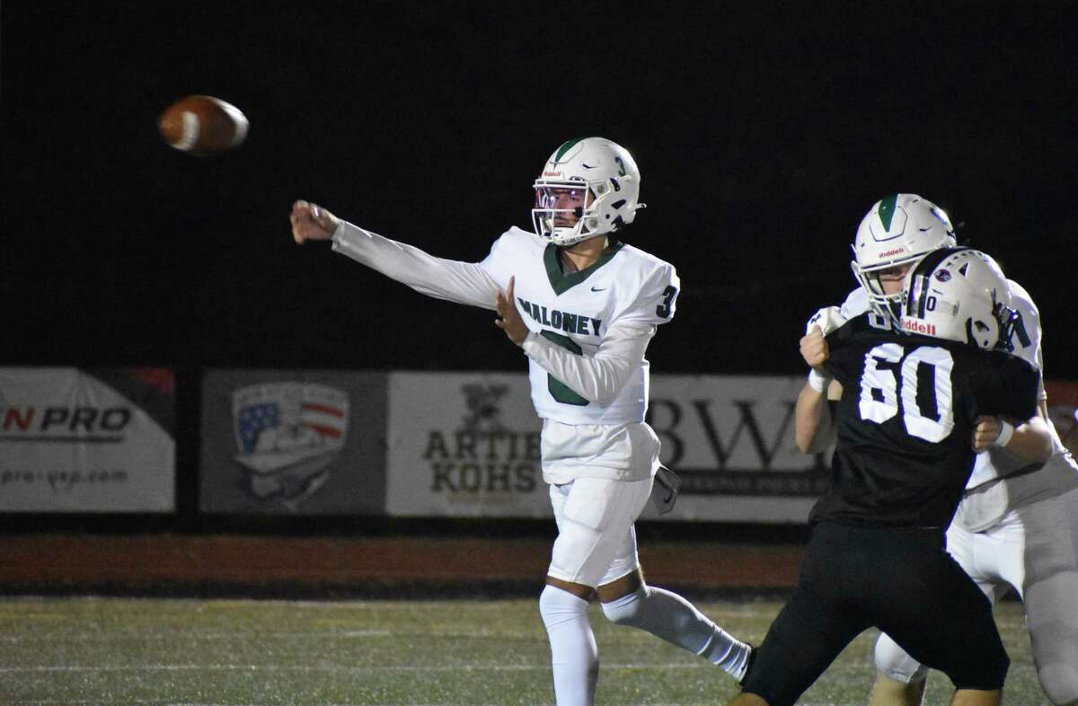 Maloney quarterback Angel Arce threw for five touchdowns in Maloney's 42-13 win in a football game against Xavier at Larry McGugh Field, Middletown on Friday, Oct. 22, 2021.
