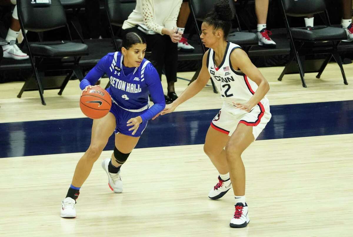 Seton Hall Pirates guard Andra Espinoza-Hunter (4) moves the ball against UConn Huskies guard Evina Westbrook (22) in the first half at Harry A. Gampel Pavilion on Feb. 10.