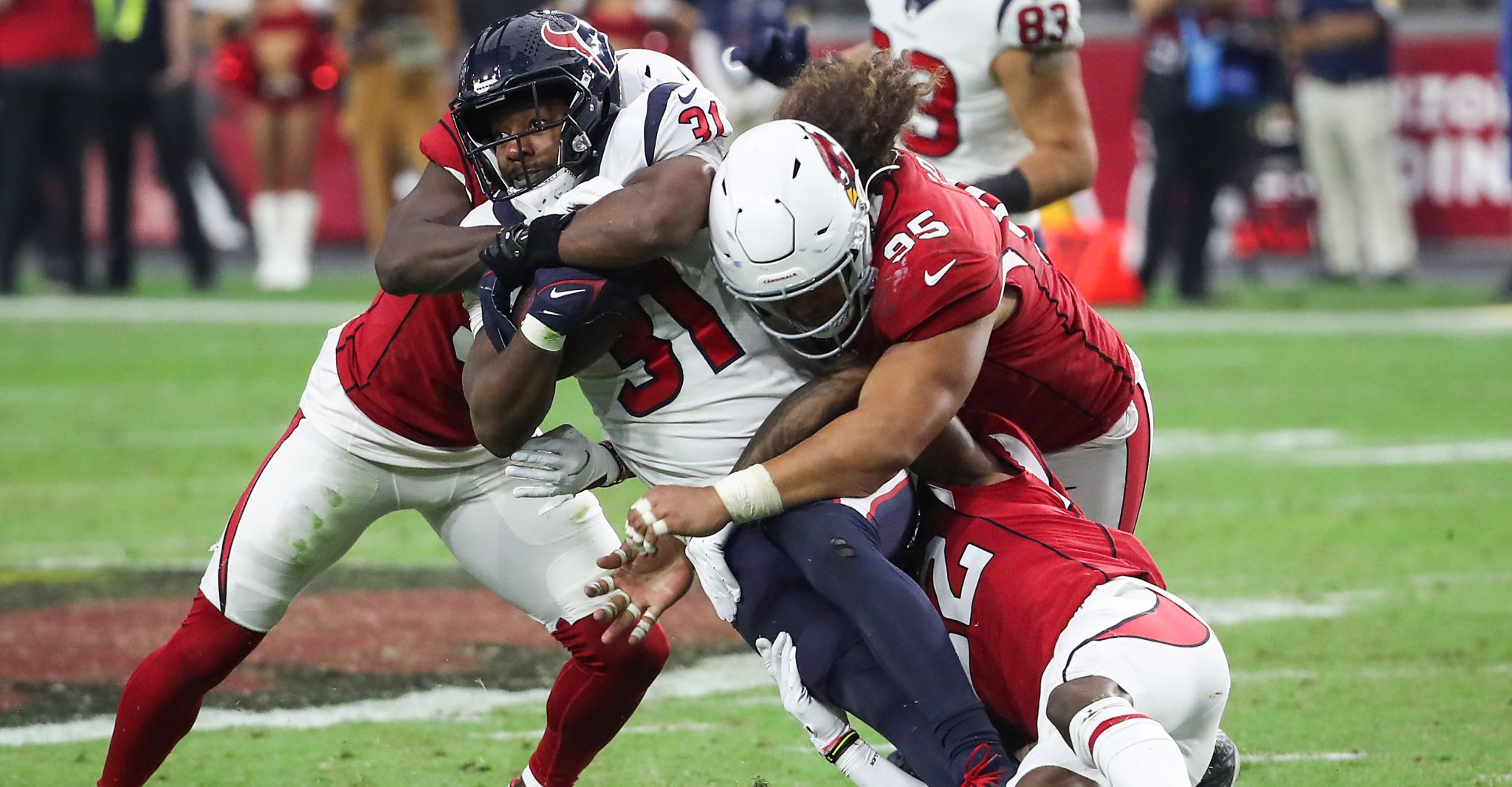 Arizona Cardinals defensive tackle Leki Fotu (95) looks up at a