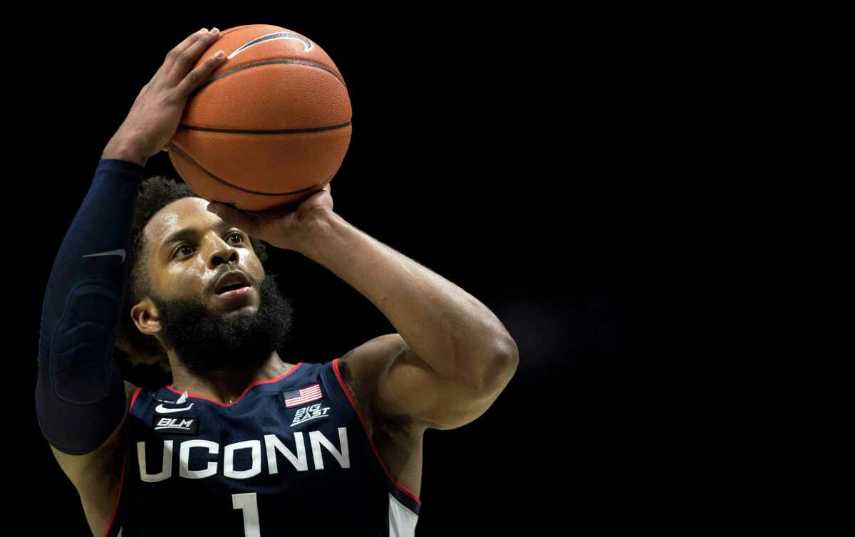 Connecticut guard R.J. Cole (1) hits a free throw with under a minute to play in the second half of an NCAA college basketball game against Xavier.