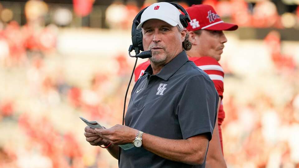 Houston Cougars head coach Dana Holgorsen seen on the sideline during the first quarter of an NCAA game against the Navy Midshipmen at TDECU Stadium on Saturday, Sept. 25, 2021, in Houston.