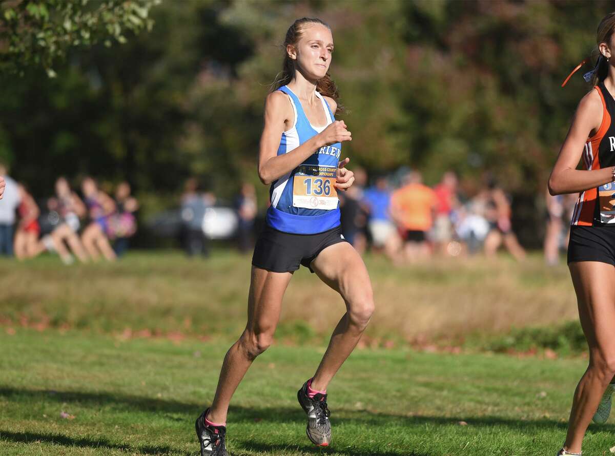 Darien’s Julianne Teitler races in the FCIAC girls cross country championship in New Canaan’s Waveny Park on Oct. 20.