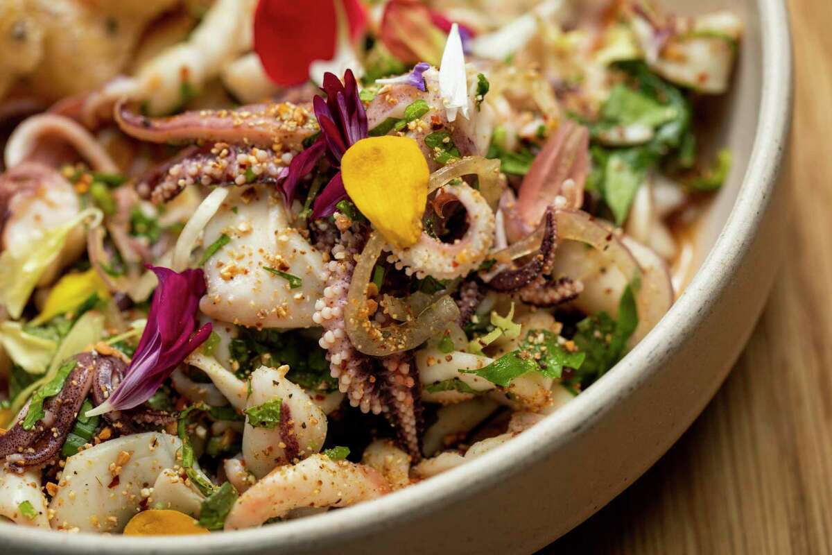 The squid salad (Monterey squid, herbs, rice powder, chile powder, sesame shrimp cracker) at Jo’s Modern Thai in Oakland.
