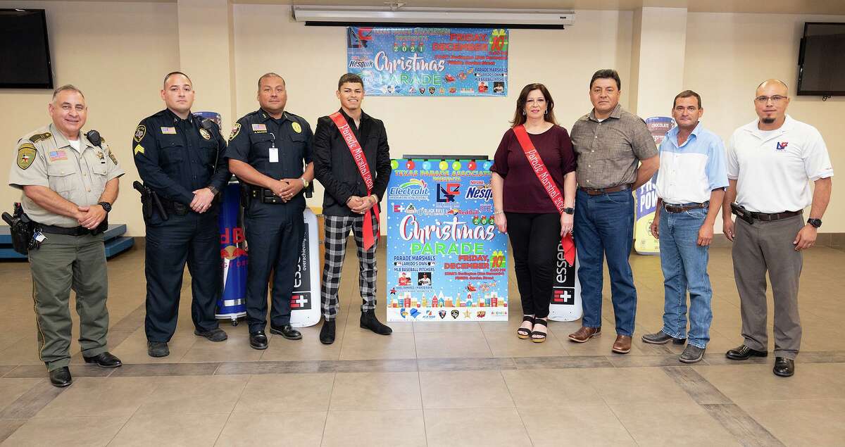 Sponsors, Parade Marshalls and organizers gather to help announce the Texas Parade Association's 57th L&F Christmas Parade, Monday, Oct. 25, 2021, at L&F Distributors. The parade is scheduled to be held on Friday, Dec. 10, 2021.