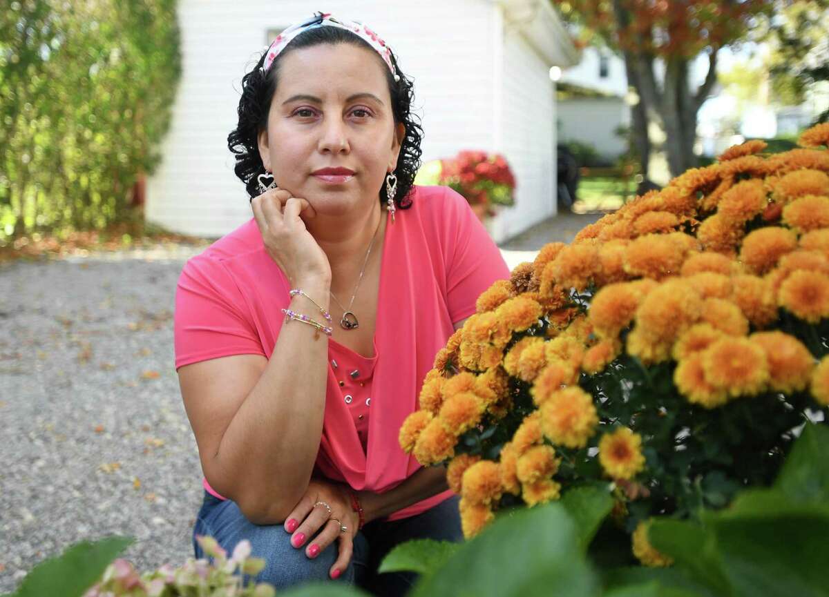 Breast cancer survivor Claudia Estrada Hernandez at her home in Bridgeport.