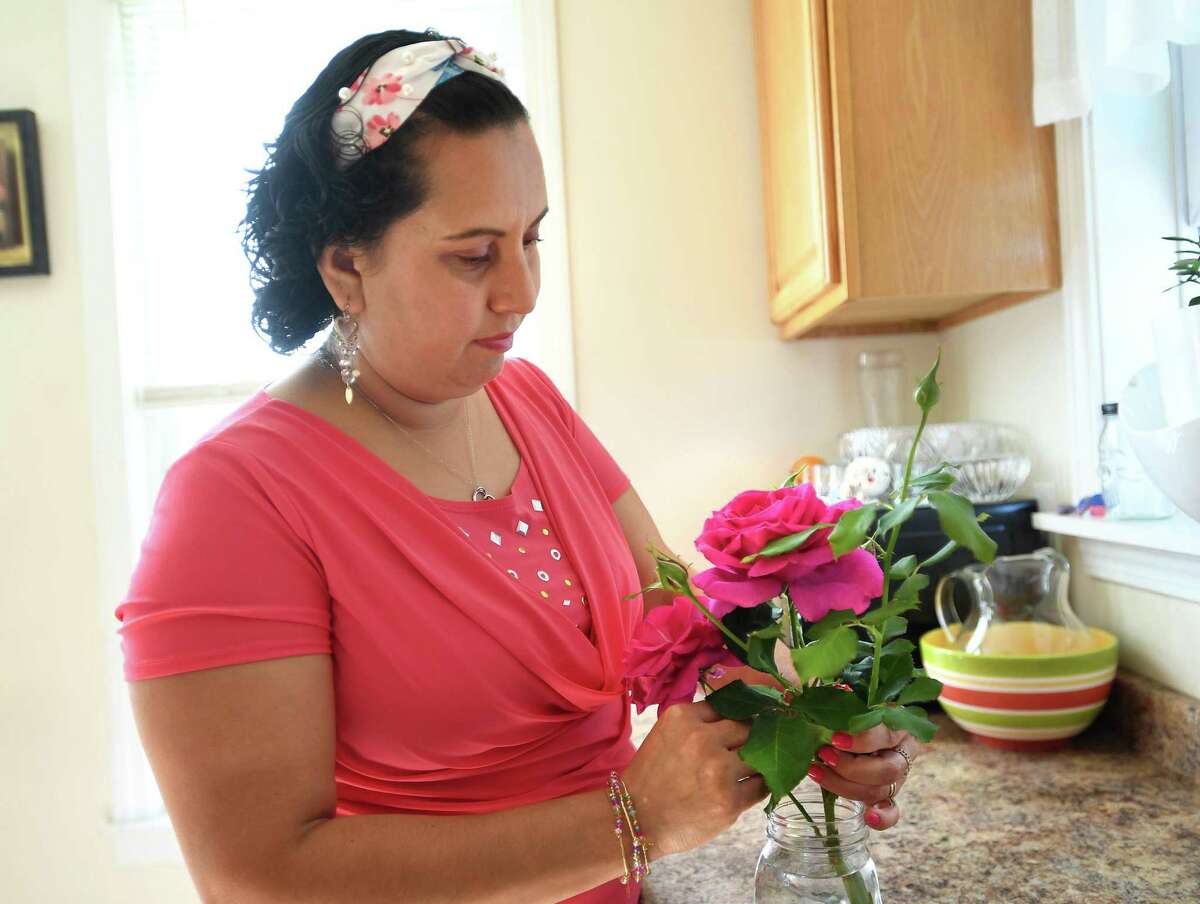 Breast cancer survivor Claudia Estrada Hernandez at her home in Bridgeport.
