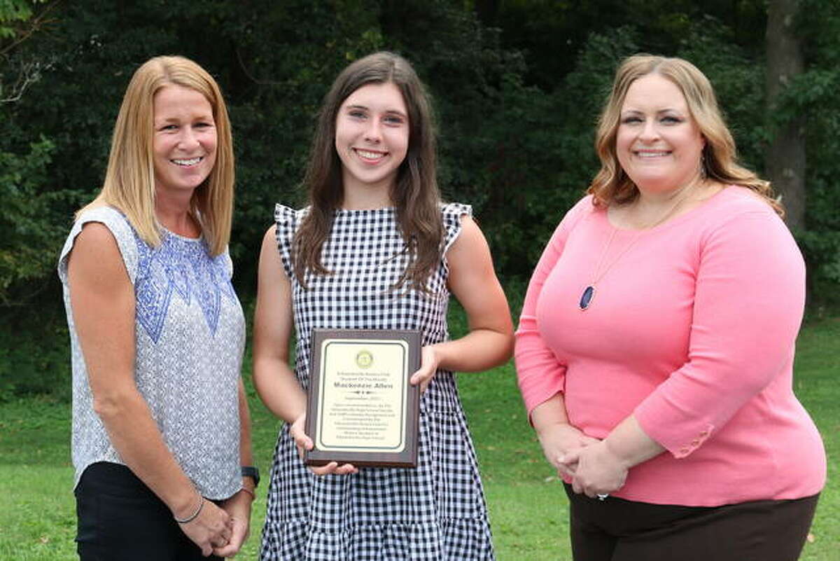 Mackenzie Allen, center, is Edwardsville Rotary Club student of the month in September.