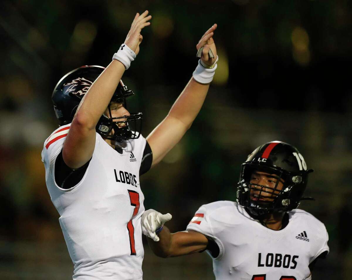 Langham Creek quarterback Tanner Murray (7) reacts after running for a 1-yard touchdown during the first quarter of a non-district high school football game at Woodforest Bank Stadium, Thursday, Aug. 26, 2021, in Shenandoah.