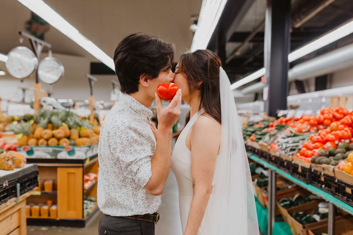 Joey Chiang and Melody Yu took their engagement photos at their favorite grocery store: Berkeley Bowl.