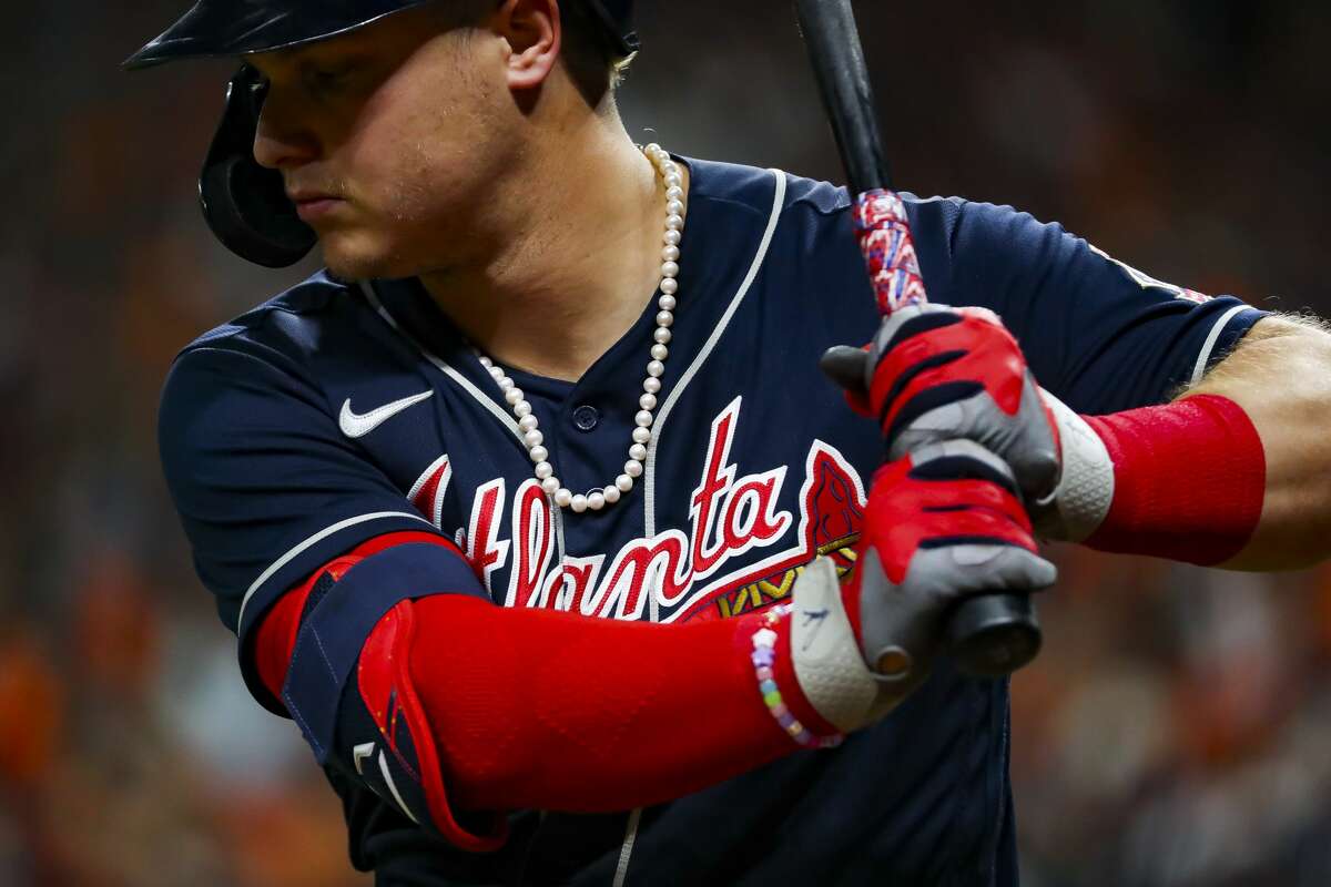Atlanta Braves right fielder Joc Pederson (22) wears a pearl necklace during the fourth inning in Game 1 of the World Series on Tuesday, Oct. 26, 2021 at Minute Maid Park in Houston.