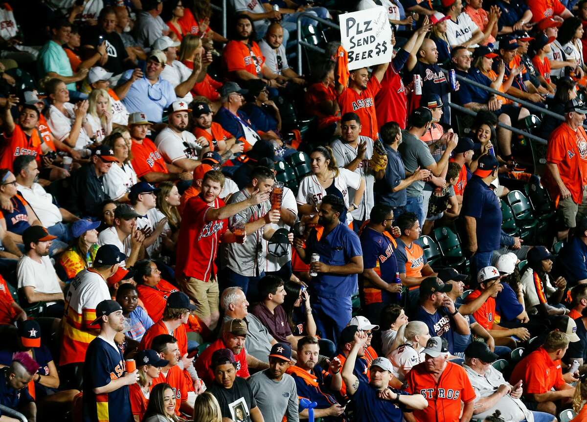 Giant crowd of Astros fans saving a woman's hat is Houston at its best