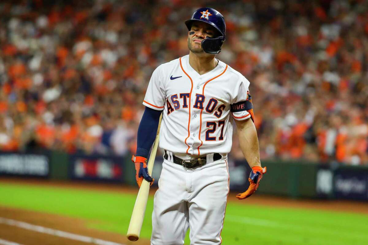 Houston Astros second baseman Jose Altuve (27) reacts after striking out swinging in the seventh inning in Game 1 of the World Series on Tuesday, Oct. 26, 2021 at Minute Maid Park in Houston.