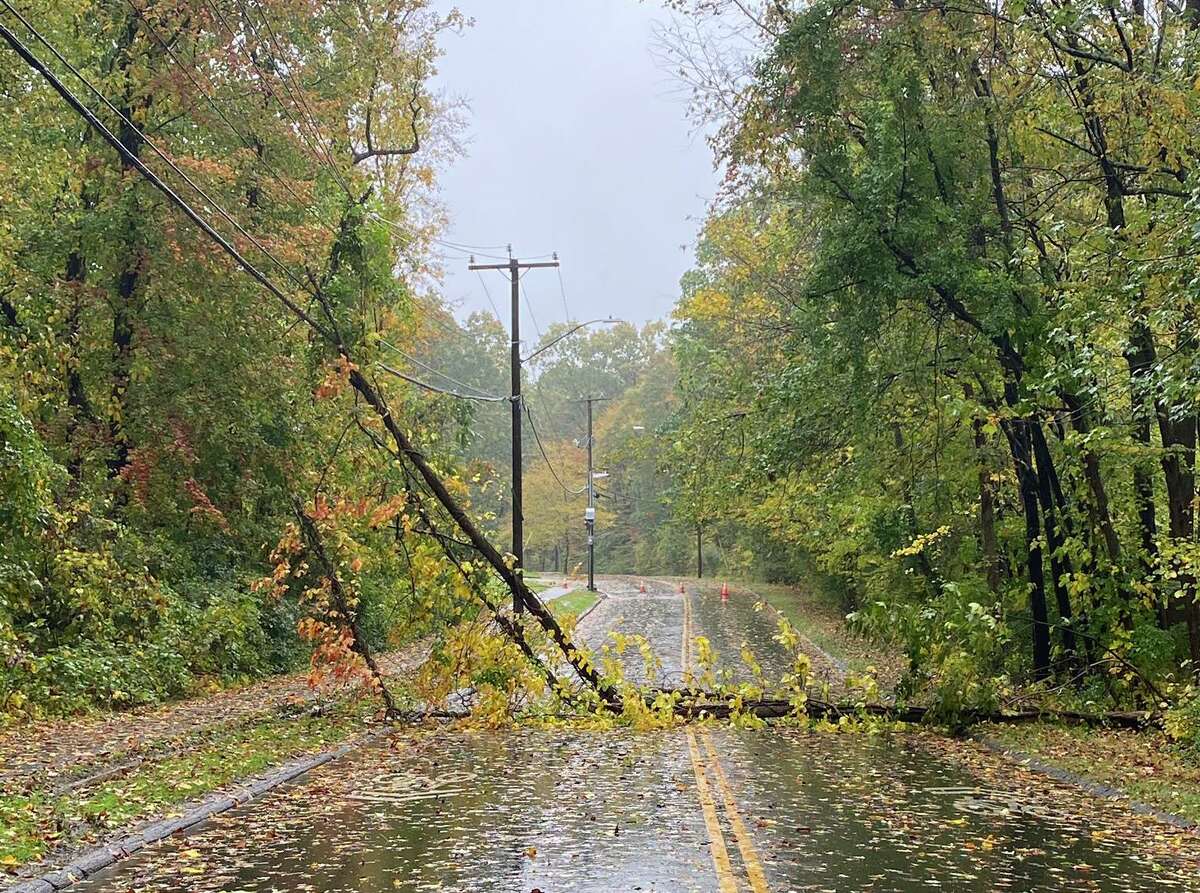 More than 5,000 utility customers across Connecticut remain without power on Wednesday, Oct. 27, 2021, after a nor’easter hit the region on Tuesday, knocking down tree limbs and power lines.