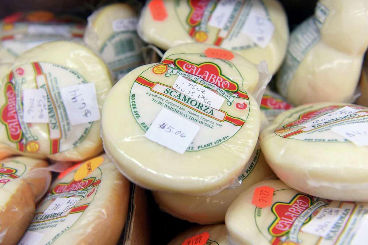 A selection of cheese are at the Calabro Cheese Corp. in East Haven, 2019.