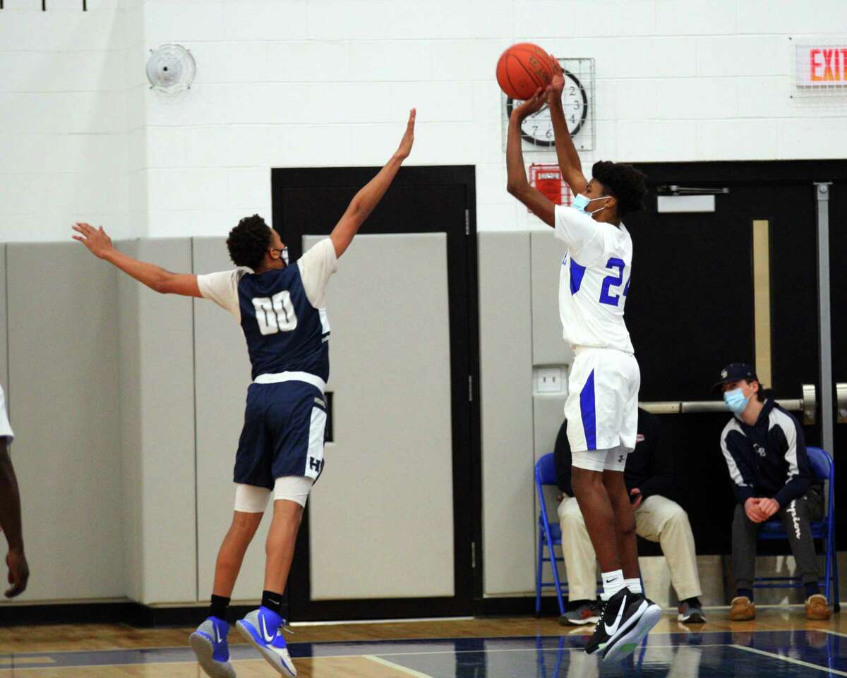 Boys basketball action between West Haven and Hillhouse in West Haven in February.