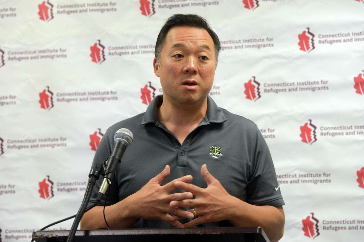 FILE PHOTO: Connecticut Attorney General William Tong speaks during a meeting at the Burroughs Community Center, in Bridgeport, Conn. Sept. 2, 2021.
