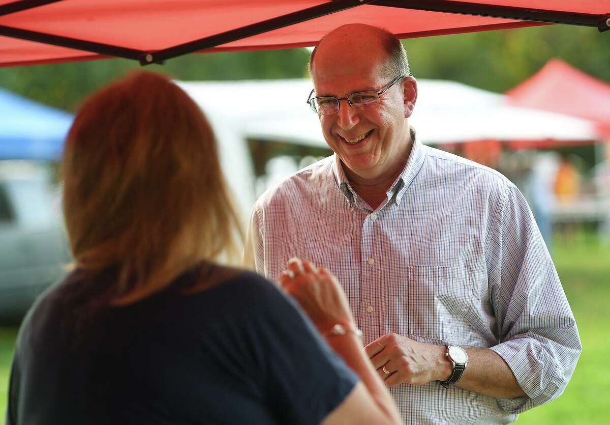 Republican candidate for Trumbull first selectman Mark Block chats with voters at the Nichols Farmers Market in Trumbull, Conn. on Thursday, October 14, 2021.