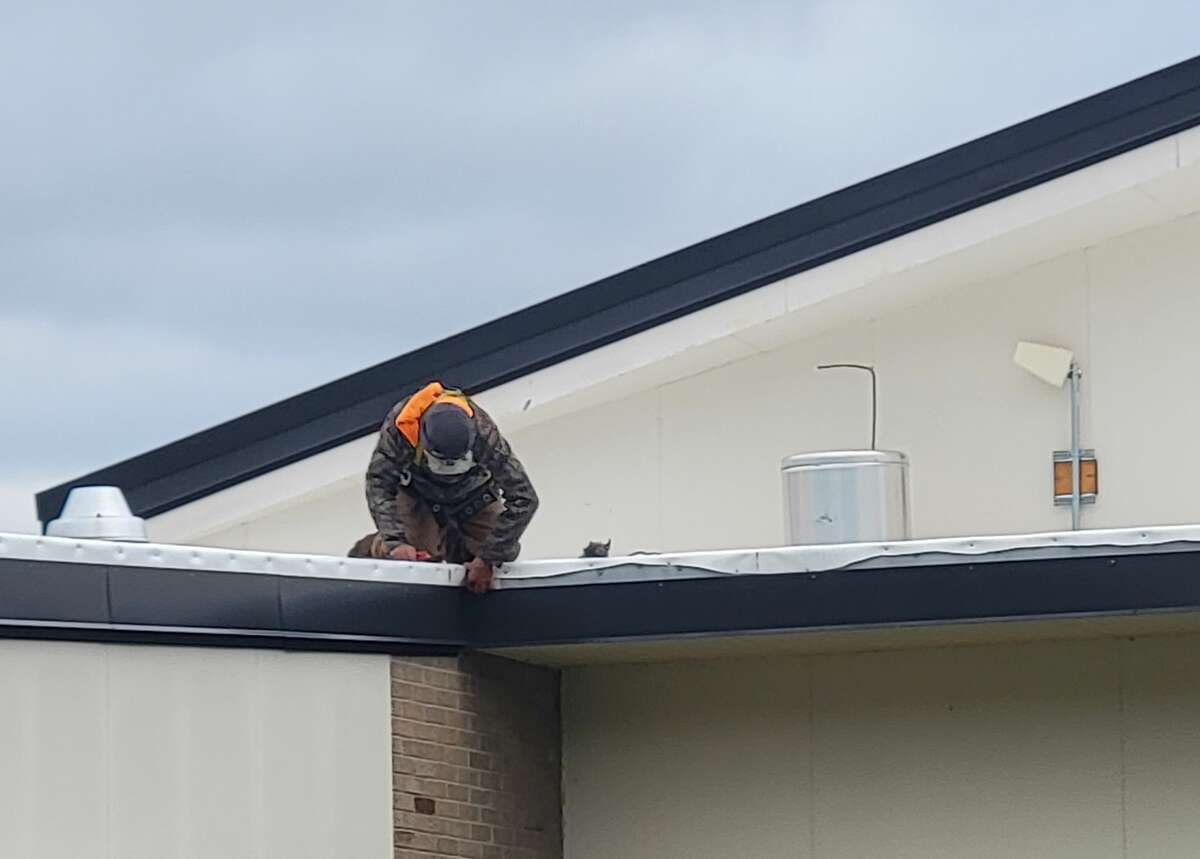 The new roof on Benzie Central High and Middle School is mostly complete, but crews are still waiting on metal edging, which is on backorder. 