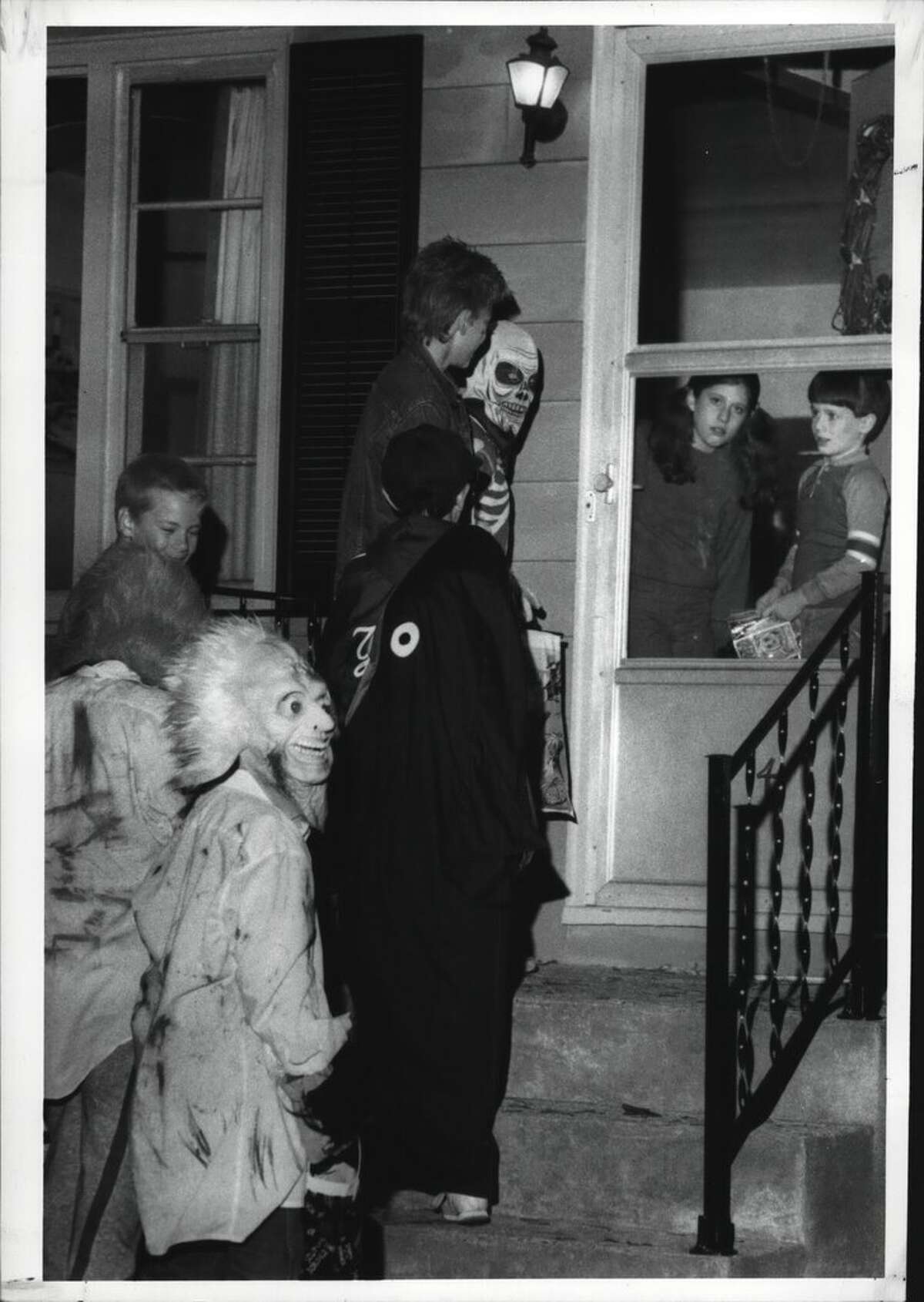 Oct. 31, 1987 Kids trick or treat in costume near Shaker High School in Colonie.