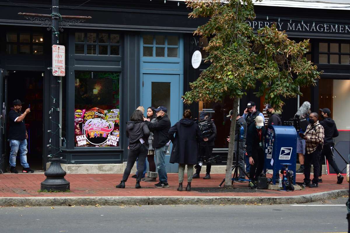 Film crew at the shooting of the Netflix movie "Mr. Harrigan's Phone," a Stephen King adaptation, in South Norwalk's Washington Street on Oct. 27, 2021.