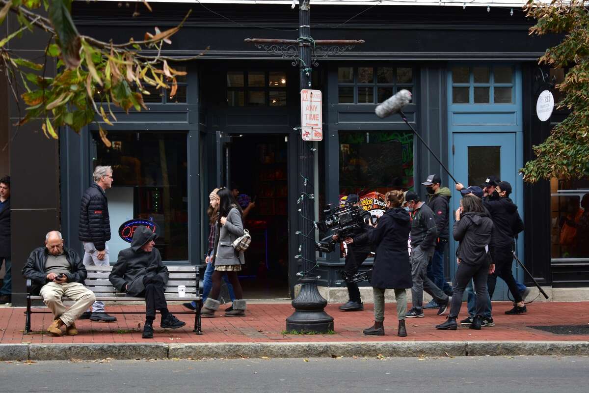 Film crew at the shooting of the Netflix movie "Mr. Harrigan's Phone," a Stephen King adaptation, in South Norwalk's Washington Street on Oct. 27, 2021.