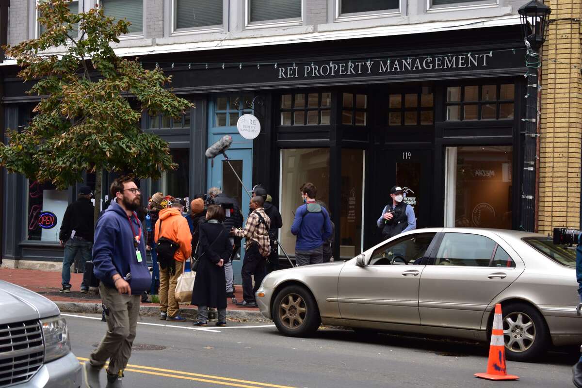 Film crew at the shooting of the Netflix movie "Mr. Harrigan's Phone," a Stephen King adaptation, in South Norwalk's Washington Street on Oct. 27, 2021.