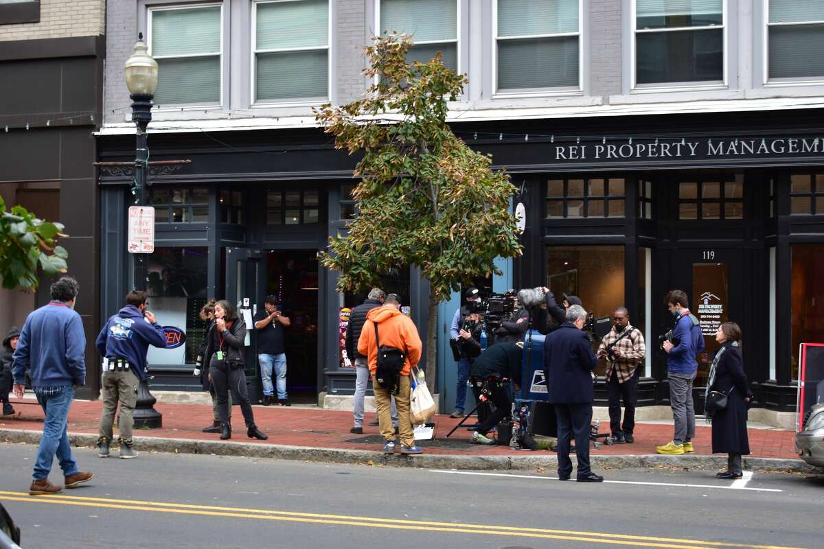 Film crew at the shooting of the Netflix movie "Mr. Harrigan's Phone," a Stephen King adaptation, in South Norwalk's Washington Street on Oct. 27, 2021.