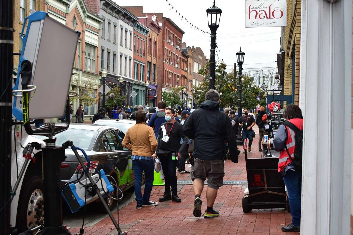 Film crew at the shooting of the Netflix movie "Mr. Harrigan's Phone," a Stephen King adaptation, in South Norwalk's Washington Street on Oct. 27, 2021.