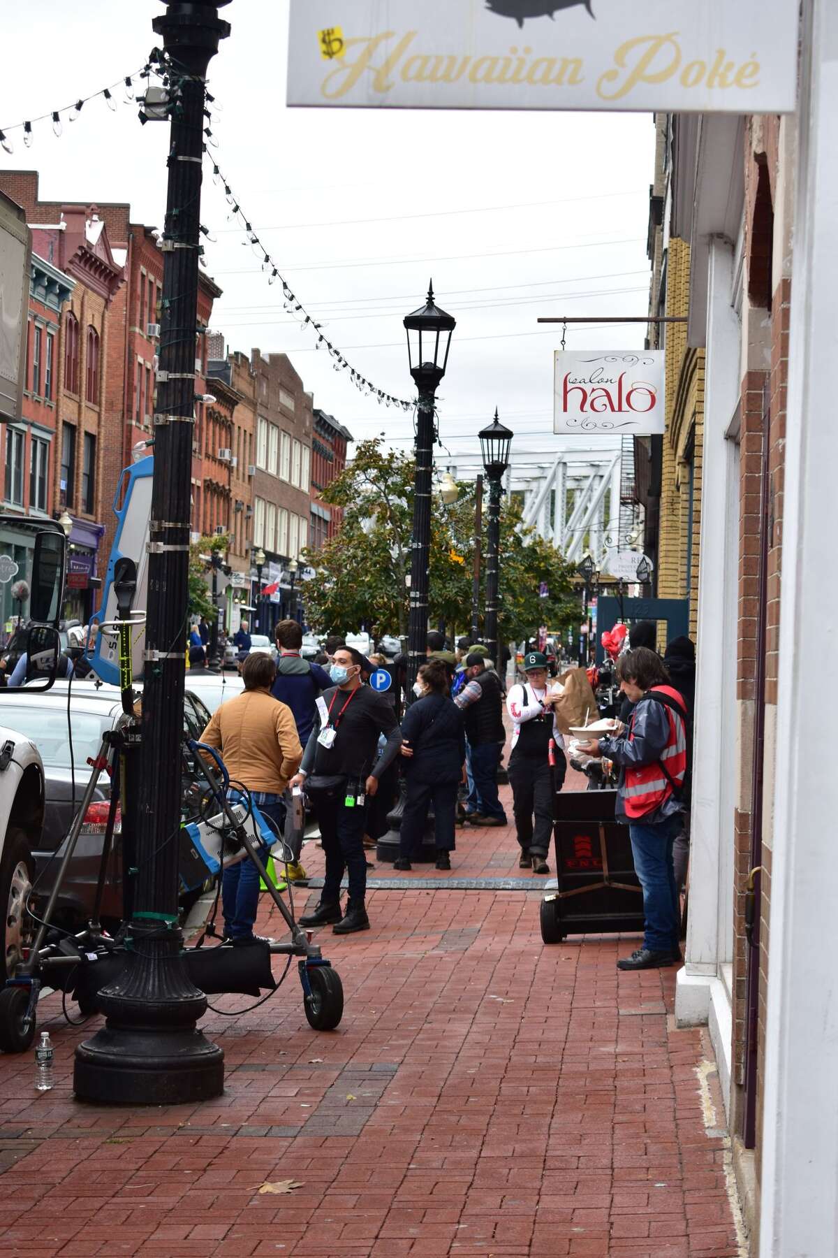 Film crew at the shooting of the Netflix movie "Mr. Harrigan's Phone," a Stephen King adaptation, in South Norwalk's Washington Street on Oct. 27, 2021.