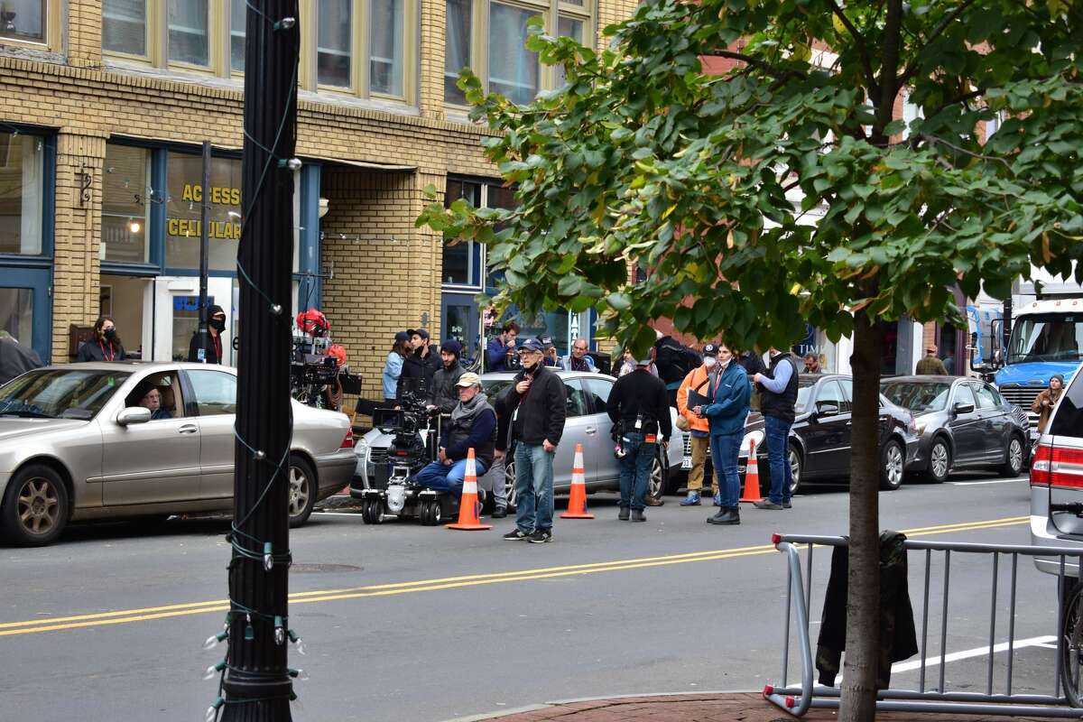 Film crew at the shooting of the Netflix movie "Mr. Harrigan's Phone," a Stephen King adaptation, in South Norwalk's Washington Street on Oct. 27, 2021.