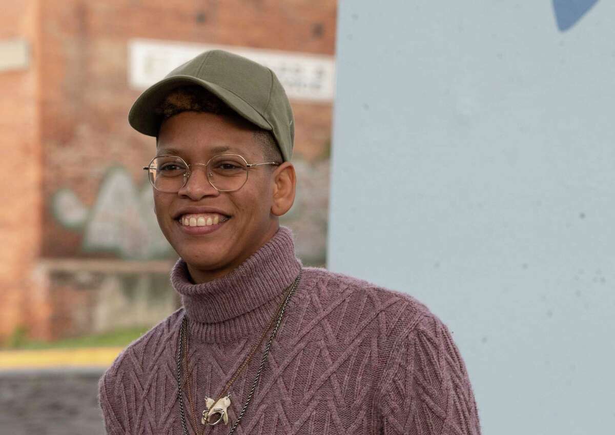 Jade Warrick, project artist, smiles during a community celebration for “Gems of Troy” Public Art Installation under the Hoosick Street Bridge on Wednesday, Oct, 27, 2021 in Troy, N.Y.